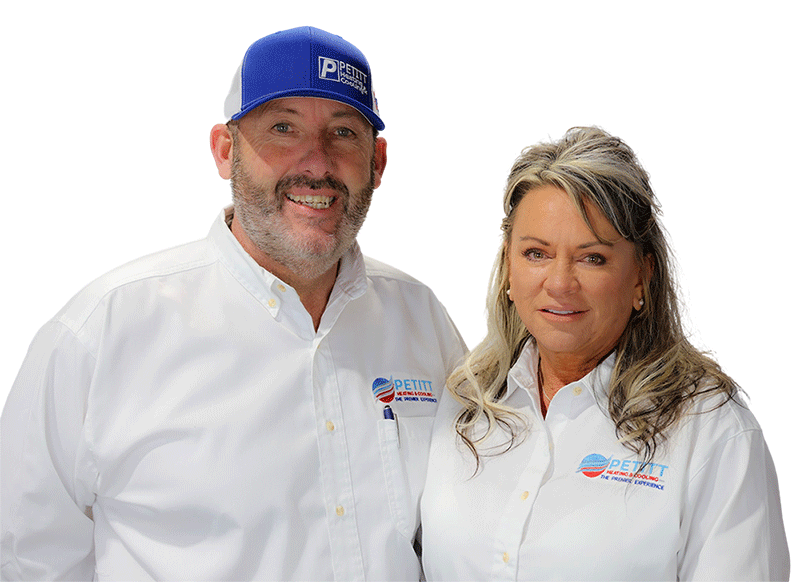 Mike and Trina Petitt dressed in Logo collar shirts and he has on a logo hat.